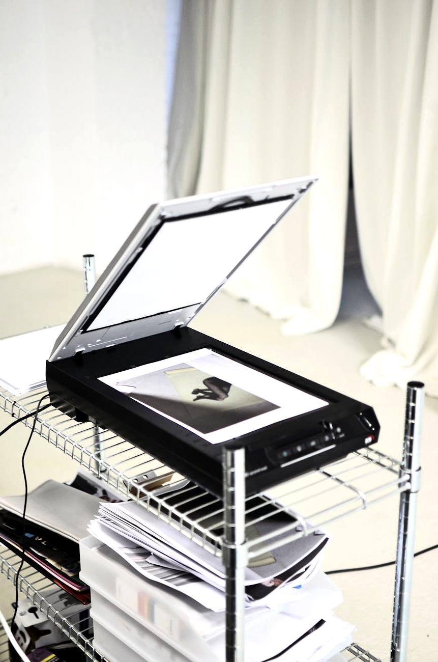 Professional scanner in action converting documents to digital files